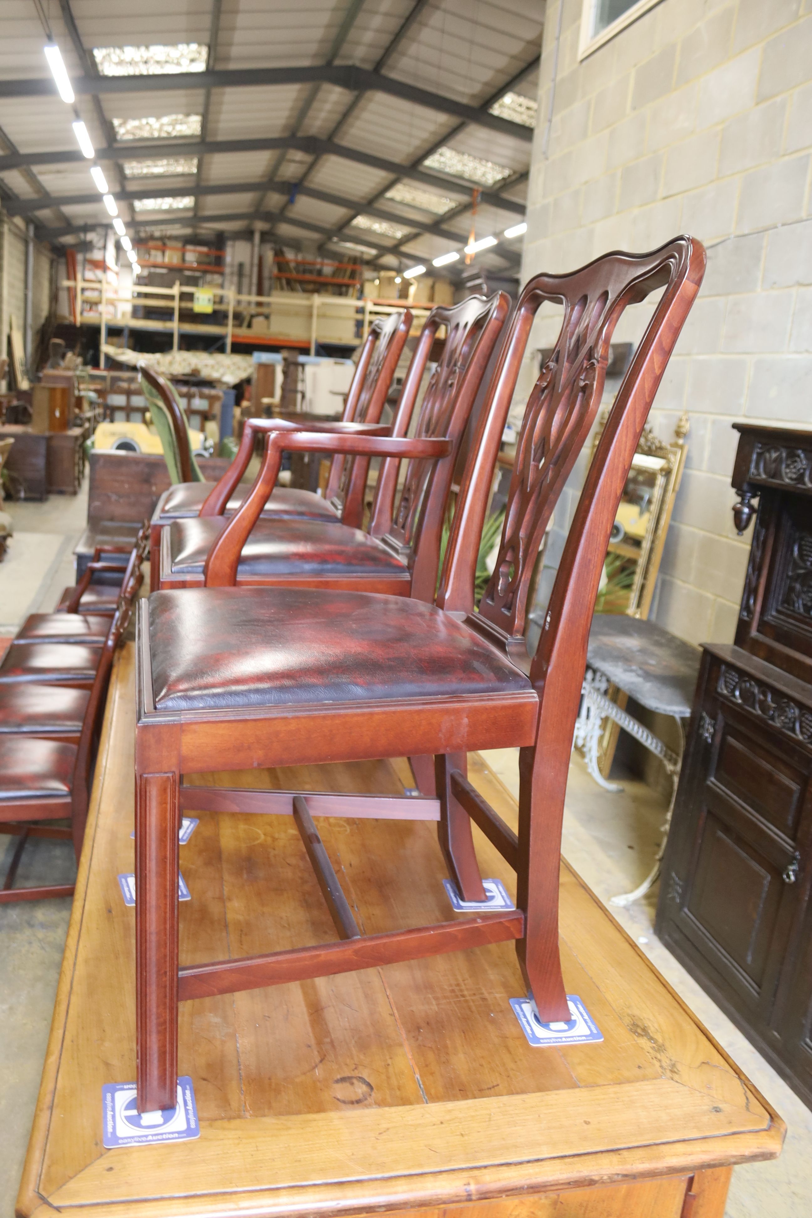 A set of eight Chippendale style mahogany dining chairs (2 arm, 6 single)